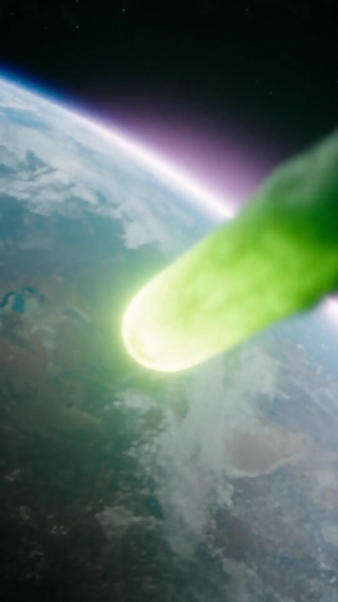 Fragment zwiastuna: świecący na zielono meteor spada na Ziemię.